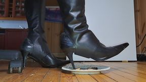 Pointy chaps Boots under desk