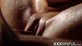 Blonde babe rides big cock in sensual water-covered session