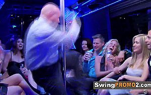 Hairless swinger husband enjoys being blown by two swinger horny chicks in the sexual red room while