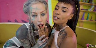 Anuskatzz captivates with daring, sultry lesbian backdoor action.