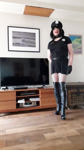 Crossdressed in slutty police uniform