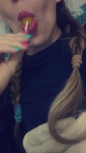sucking lollipop