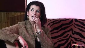 An elegant brunette MILF uses her holes to satisfy two very lustful gentlemen