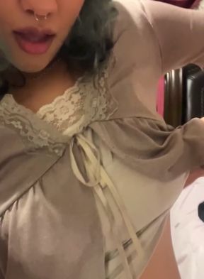 Teeny bopper flaunts her juicy tits in a solo scene