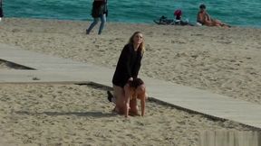 Naked Euro babe disgraced on the beach