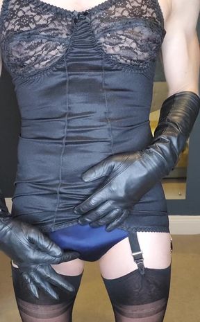 Am I making you horny sliding on my long leather gloves and teasing in my black corsellete and fully fashioned stockings? Soo we