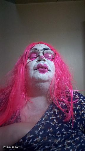 TV clown slut plays with her breasts for you