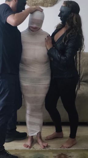 Mummifying Natasha with White Tape!