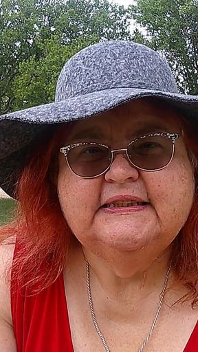 Nurse Vicki Smoking in the Park on a Bench All Dressed up