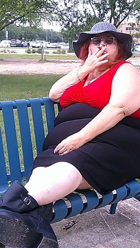 Nurse Vicki Smoking in the Park on a Bench All Dressed up