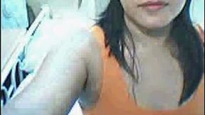 Mature Filipina webcam whore shows off her tits and bald pussy