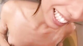 Japanese beauty delights her man with soapy massage