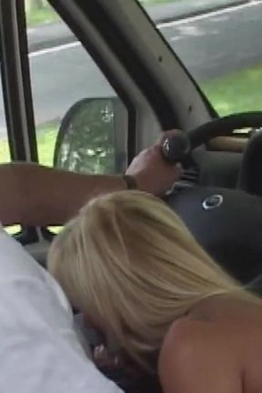 She Sucks His Cock While Driving and Then Gets Fucked in the Camper