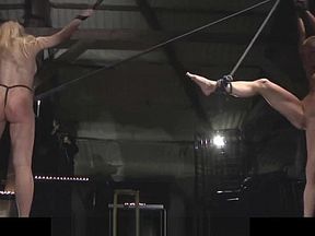 Restrained girl pussylick another under command in bdsm