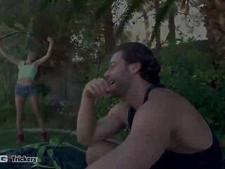 Lewd teen brunette hair with a nicely trimmed twat is having hardcore sex in the tent