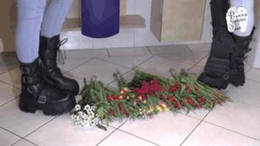 Flowers under cruel Boots