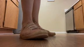 Well worn pink tennis shoes