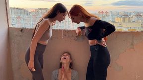 mistresses agma and sofi spit on slave-girl on a public balcony - lezdom spitting