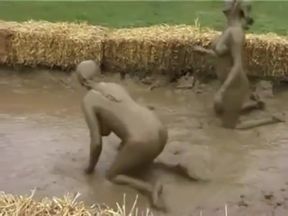 Naked mud wrestling