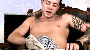 ”Amateur homo with sweet tattoos masturbates his huge dick”