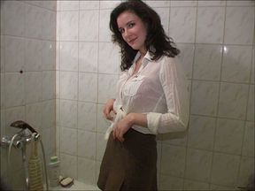 Mesmerizing brunette Russian beauty in the shower room