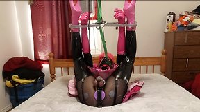 Bound in spreader bar: ankles and wrists locked