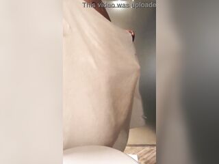 Sexually excited penis hidden by a towel in hotel