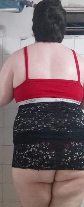 Secretary waiting for the boss in a thread thong and a wet bodice in the bathroom