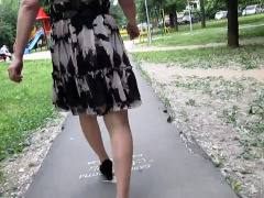 Crossdresser in stockings goes out for a walk with camera