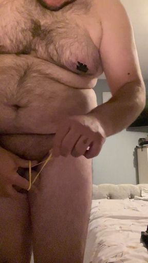 Cock and Ball Bondage Under Swimsuit with Nipple Clamps