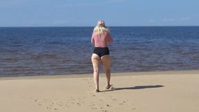 Naughty bitch in beach