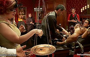 Busty slave tits clamped at party