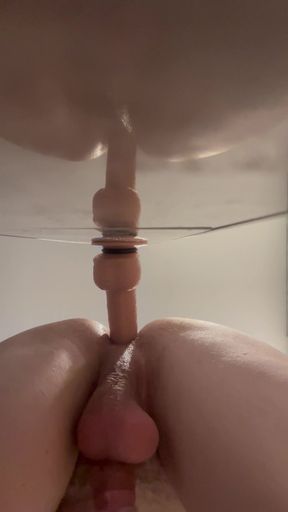 Amateur bisexual engages in hot anal play with huge dildo