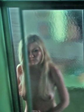 Kirsten Dunst showcases her famous tits in a sexy solo scene