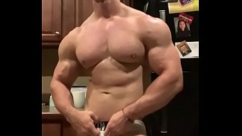 muscle jock flexing, posing, stroking cock &amp_ talking s.