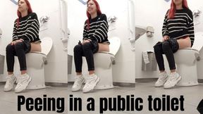 Peeing in a public toilet