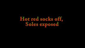 Hot red socks off, Soles exposed