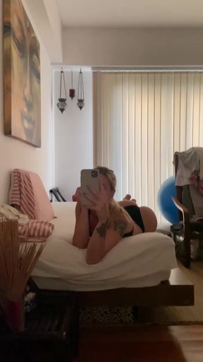 Female Onlyfans Model Posing in Bedroom