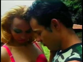 Pretty young shemale Claudia Hunter in red lingerie was banged on the cutting in a forest