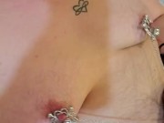 nonbinary babe plays with nipple clamps
