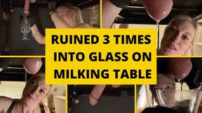 Close up ruined multiple times into a glass on the milking table