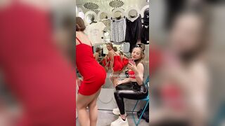 small girls play together, strokve each other into fitting room