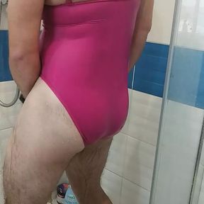 Crossdresser on sexy pink One piece swimsuit jerking