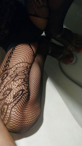 Wetlook in Bathroom in Black Fishnet Body, Denim Shorts and High Heels Shoes