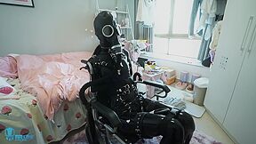 Latex 014 Rubber Girl Wheelchair