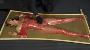 Tickling in a latex vacuum bed in red mesh with pear gag