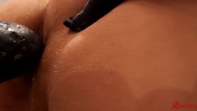 Mistress Sadistra uses strapon to fuck her submissive's ass