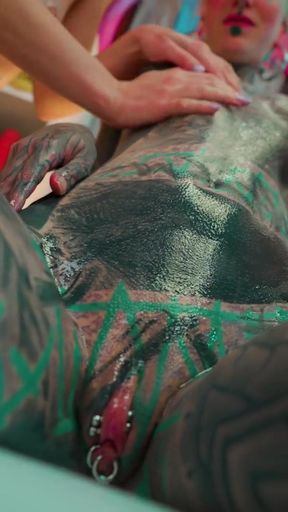 Oiled Tattooed Lesbians Toy Sharing Metal Pleasure   Clip 2