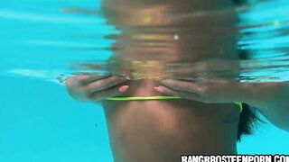Adorable oriental eighteen gets nude into the pool with a