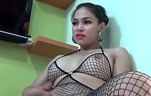 Busty ts in fishnet masturbates